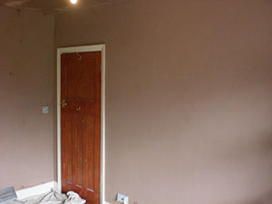Professional plasterer in Wimbledon SW19. Professionally plastered smooth ceiling in a 2nd bedroom.