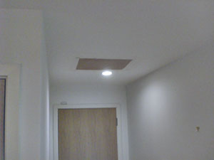 Hole in hallway ceiling, plaster repair in Southfields SW18, SW19