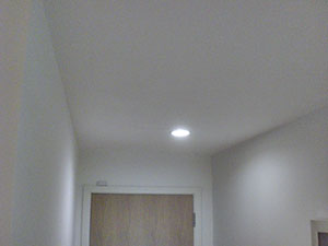 Hole in hallway ceiling has been repaired with plasterboard, finishing plaster & 3 coats of paint in Southfields SW18, SW19