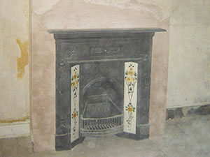 Float & Set plastering services - Wall was floated around a newly installed fireplace prior to skimming - Earlsfield London SW18