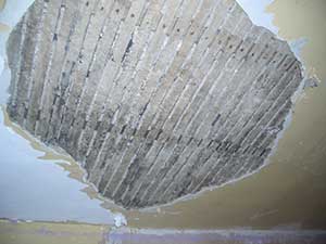 Ceiling requiring plaster repair following leak. Ceiling was Plasterboarded & skimmed - Earlsfield London SW18