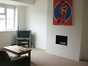 Newly plastered painted & decorated lounge in West Wimbledon SW20. Note the remarkable change that can be acheived for a relatively small cost by employing a professional plasterer painter & decorator